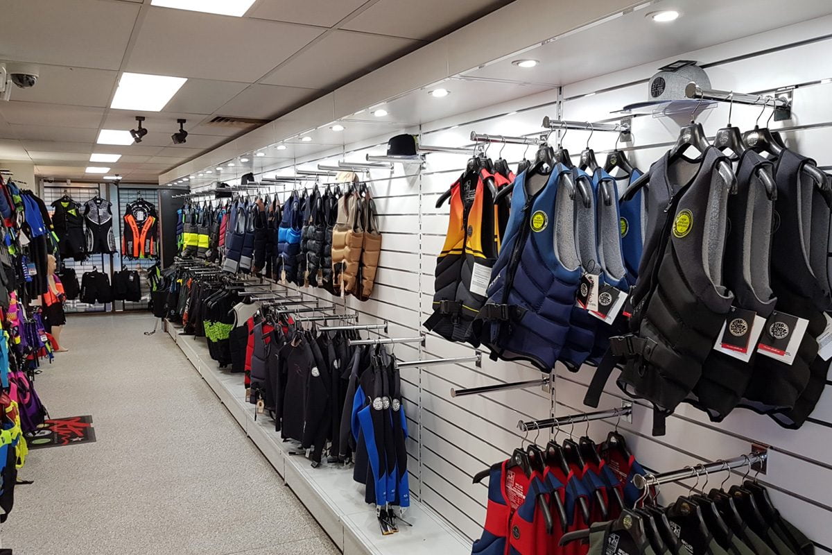 clothing wall in watersports store