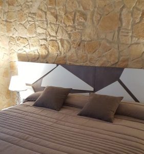 fake stone Decorative wall panels in bedroom